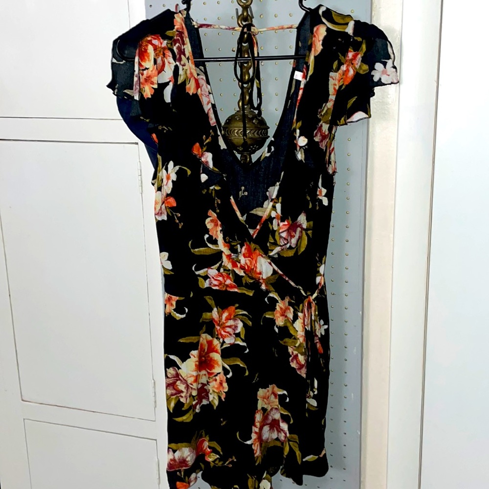 Cute black floral low cut romper
